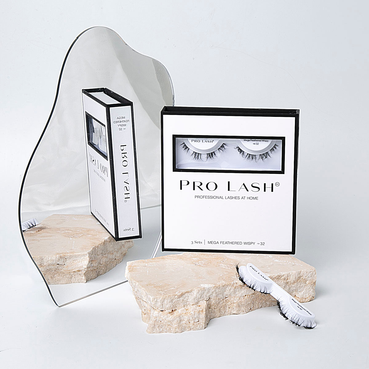 Feather lashes extensions set featuring three pairs of Mega Feathered Wispy No.32 lashes in sleek Pro Lash packaging.