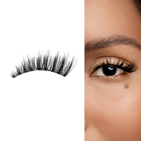 Mega volume cat eyelash extensions shown on eye with dramatic outer flare and thick, layered lash strip.