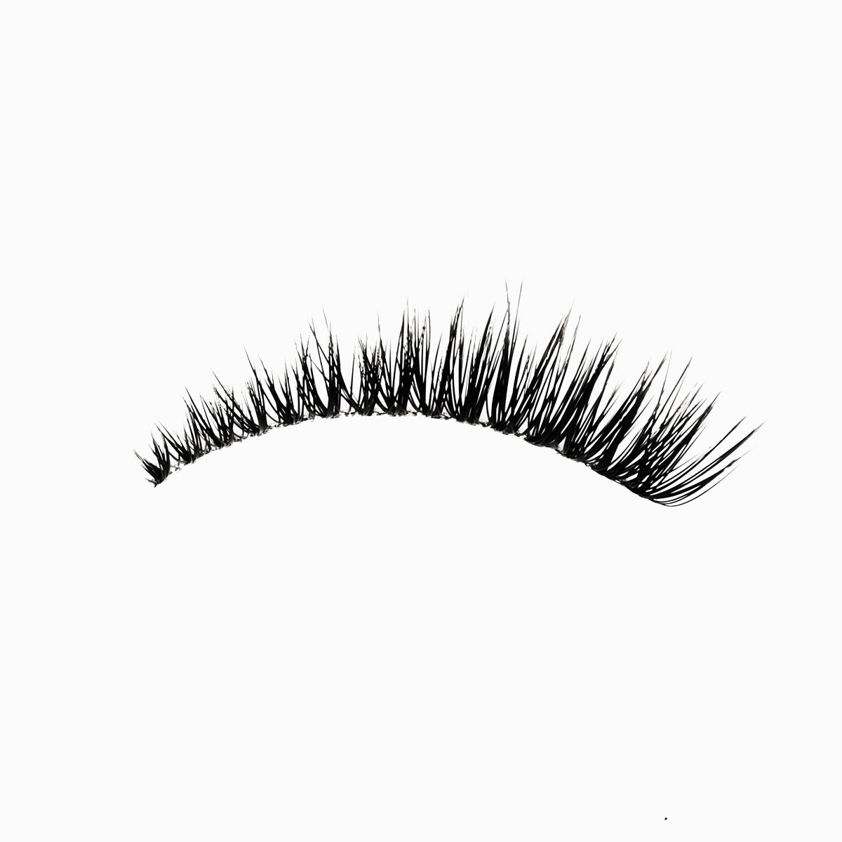 Wispy volume eyelash extensions with flared cat eye shape and layered texture for a lifted, dramatic effect.