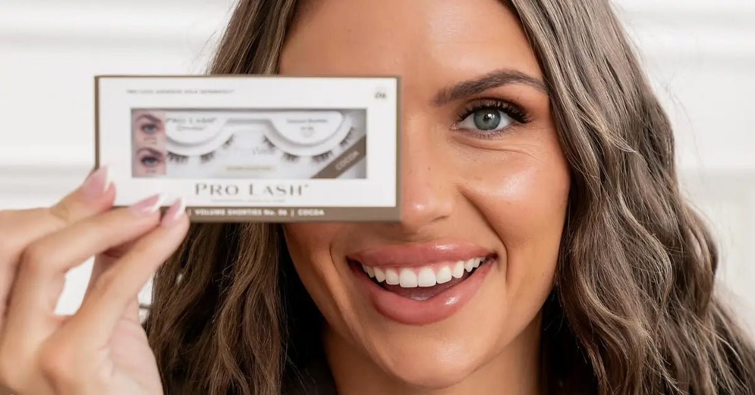 DIY eyelash application demonstrated by a smiling woman holding a Pro Lash box over one eye