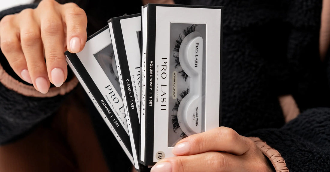 Lash extension differences shown across multiple Pro Lash boxes including Natural, Classic, and Volume Wispy styles held in a woman's hands