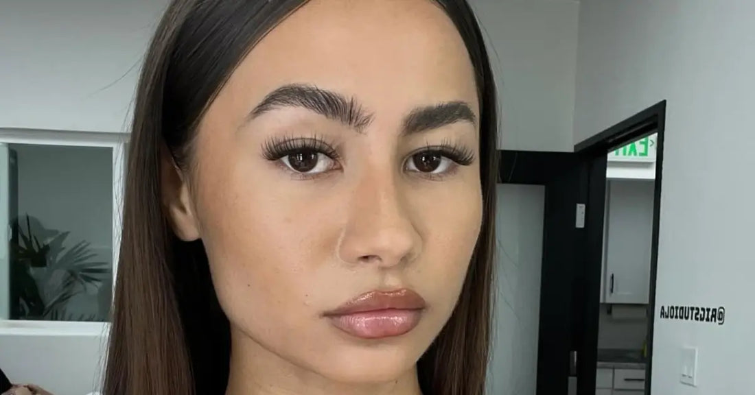 Natural volume lashes creating a full, fluffy look with soft definition and balanced length