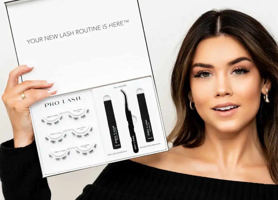 Lash extension kit held by smiling woman featuring lashes, adhesive, tweezers, and remover.