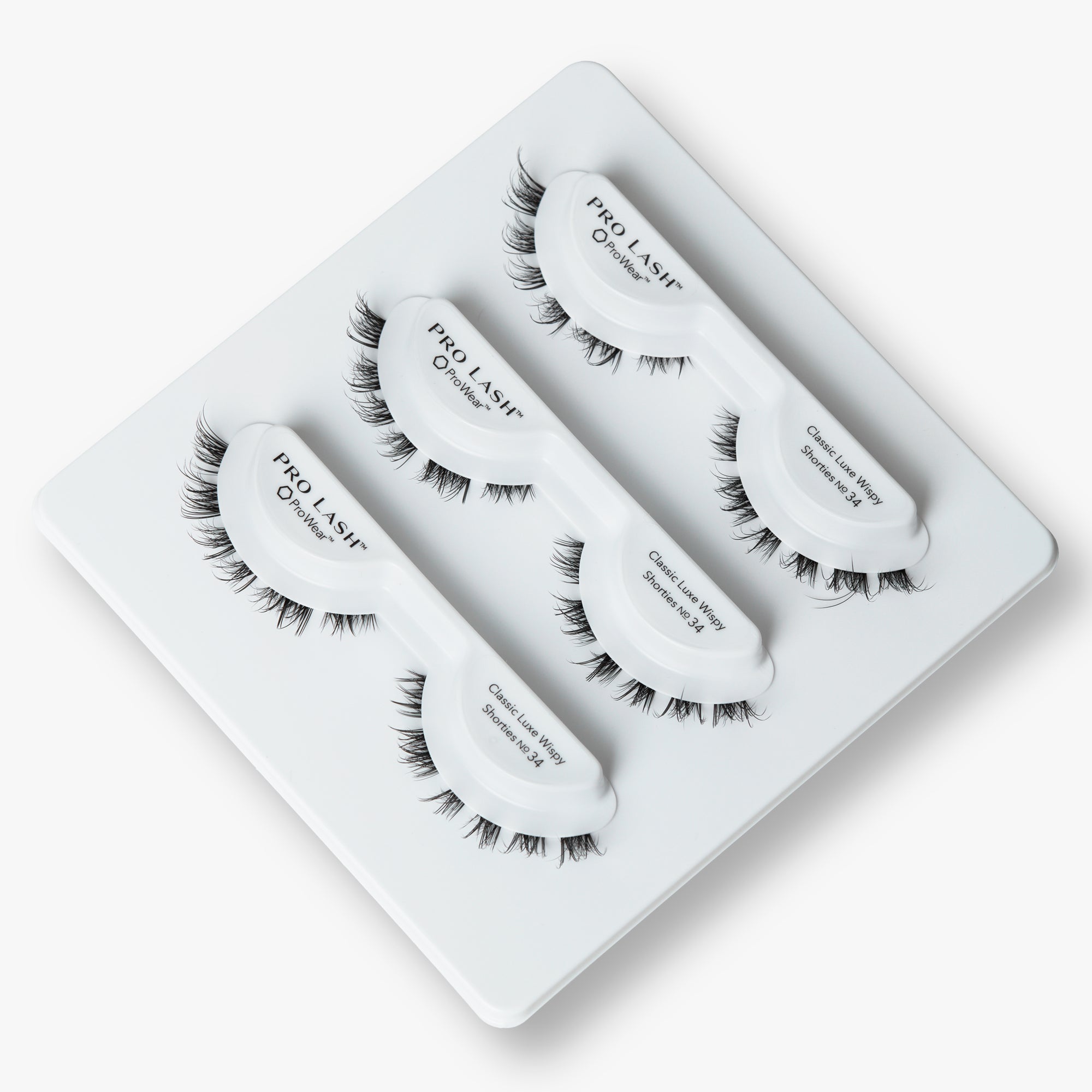 Short volume lashes in Pro Lash Classic Luxe Wispy Shortie No.34 3-pack tray, featuring clustered design for soft, natural definition