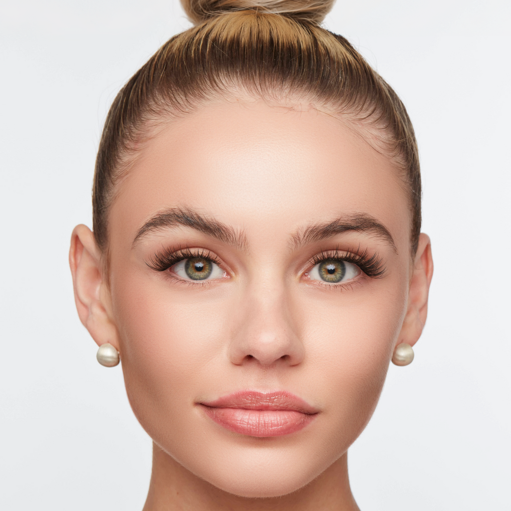 Classic wispy lashes styled on a woman with a polished look, featuring defined volume and soft, natural length