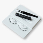 Eyelash extension kit for beginners featuring Pro Lash Classic No. 01 lashes, adhesive, and tweezers for easy application.