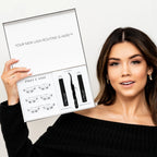 Best eyelash extension kit displayed by a woman holding an open Pro Lash box with lashes, adhesive, remover, and tools.