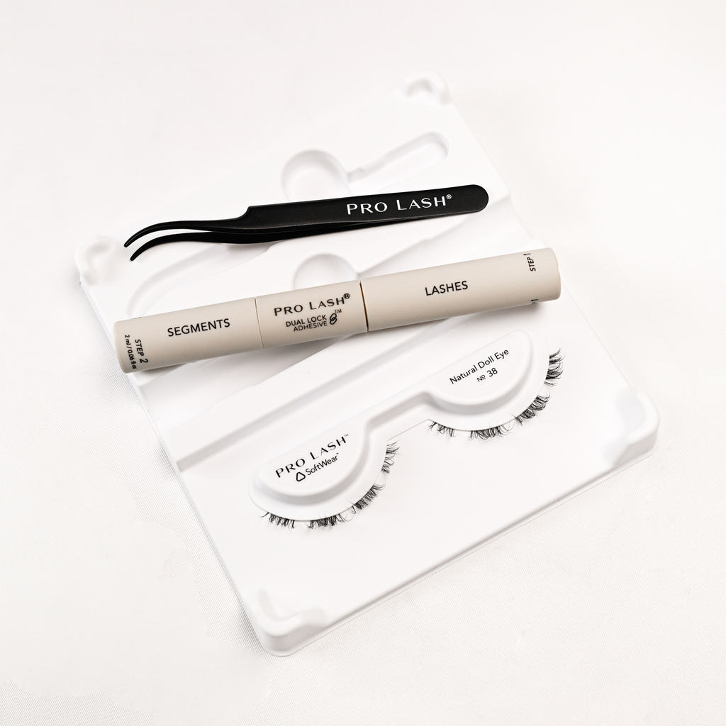Eyelash extension kit with Pro Lash segments, adhesive, tweezers, and Natural Doll Eye No. 38 lashes.