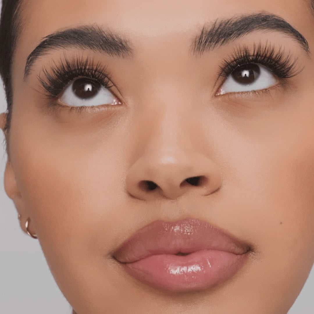 Classic wispy lash set applied for a full, fluttery look with soft volume and defined length on both eyes.