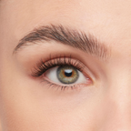 Volume eyelash extensions kit applied on eye, showcasing full, fluttery lashes with a natural yet enhanced appearance
